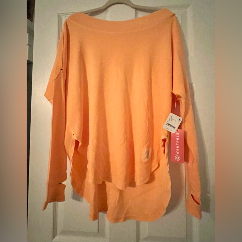 Free People FP Movement bright orange open back pullover size S - NWT new